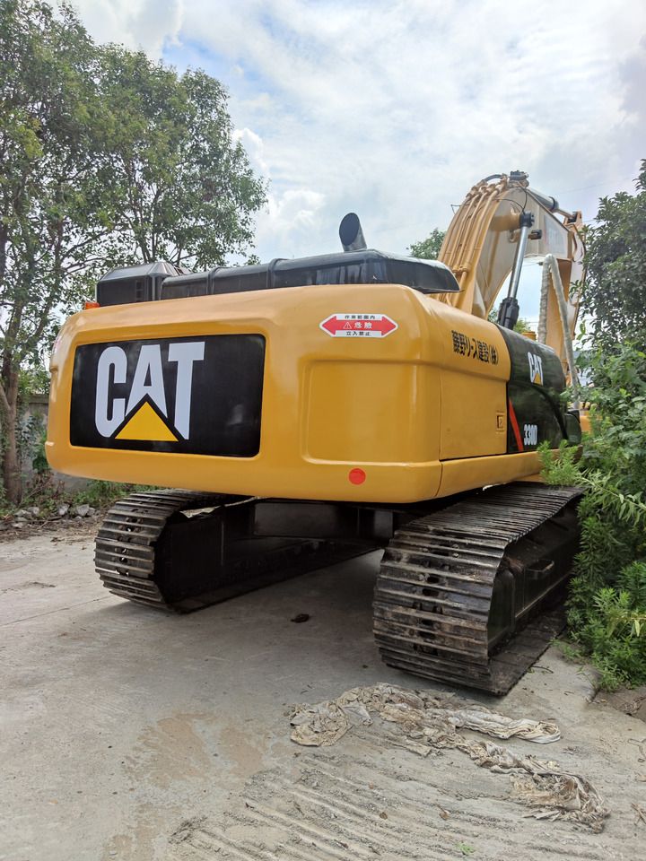 Caterpillar 330D crawler excavator, rear view Caterpillar 330D crawler excavator, rear view