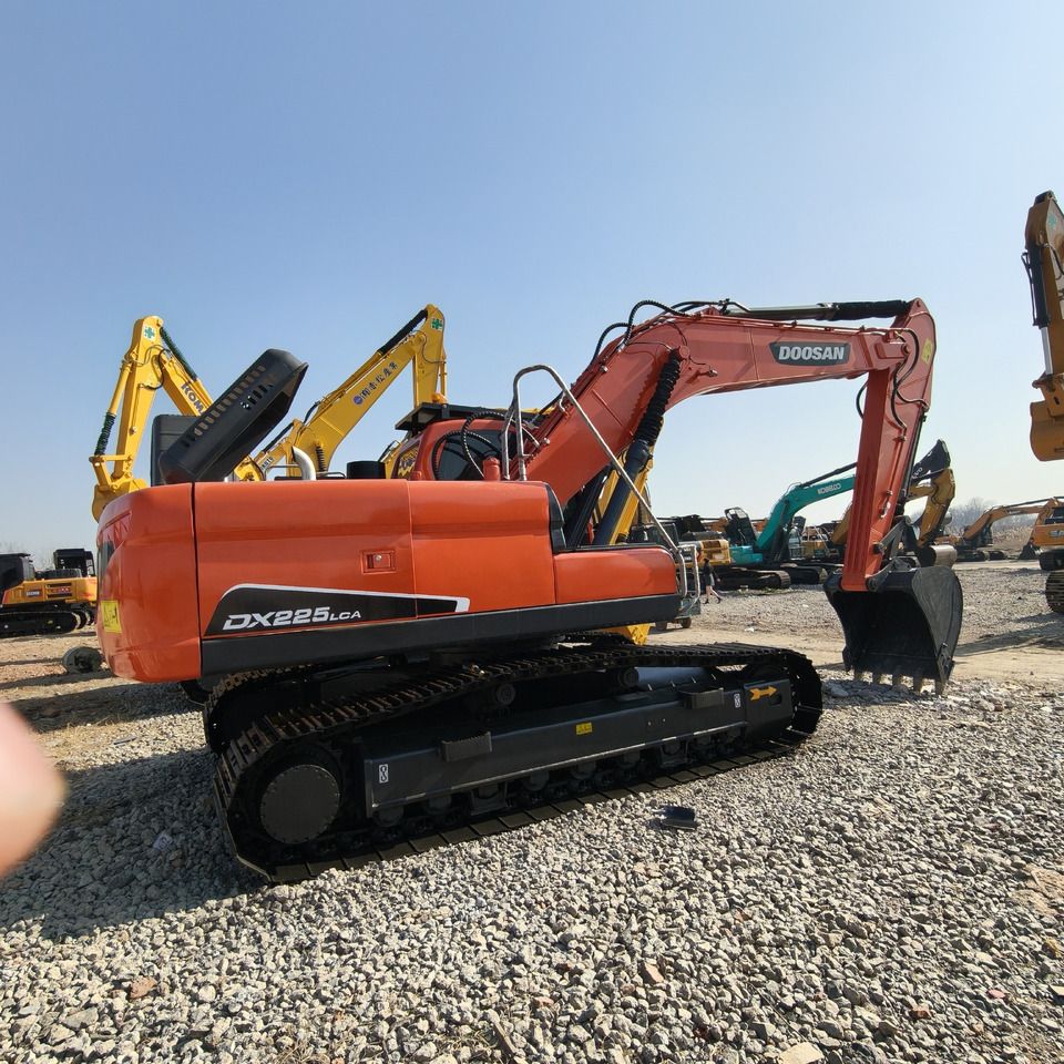 2024 Doosan DX225LCA crawler excavator, rear three-quarter view