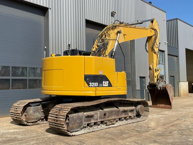 2012 Caterpillar 328D crawler excavator, rear three-quarter view 2012 Caterpillar 328D crawler excavator, rear three-quarter view