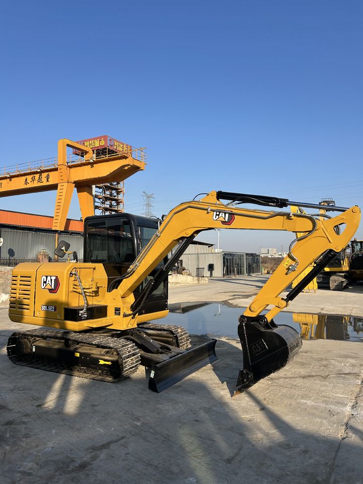 2023 Caterpillar 305.5E2 mini excavator, side view 2023 Caterpillar 305.5E2 mini excavator, side view