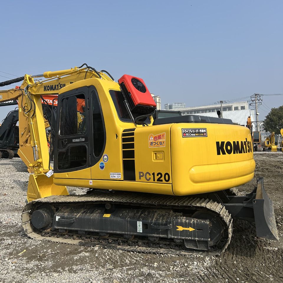 2014 Komatsu PC120-8 crawler excavator, rear three-quarter view 2014 Komatsu PC120-8 crawler excavator, rear three-quarter view