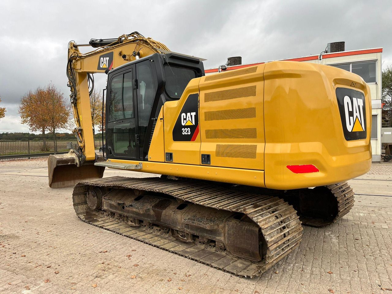 2018 Caterpillar 323 crawler excavator, rear three-quarter view 2018 Caterpillar 323 crawler excavator, rear three-quarter view