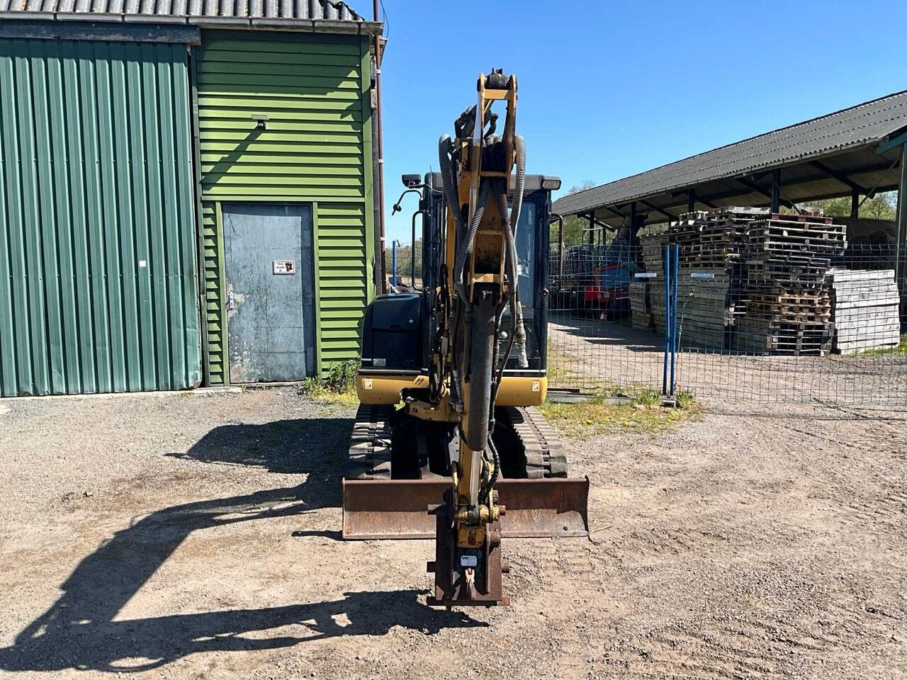 Caterpillar 303.5 mini excavator, front view Caterpillar 303.5 mini excavator, front view