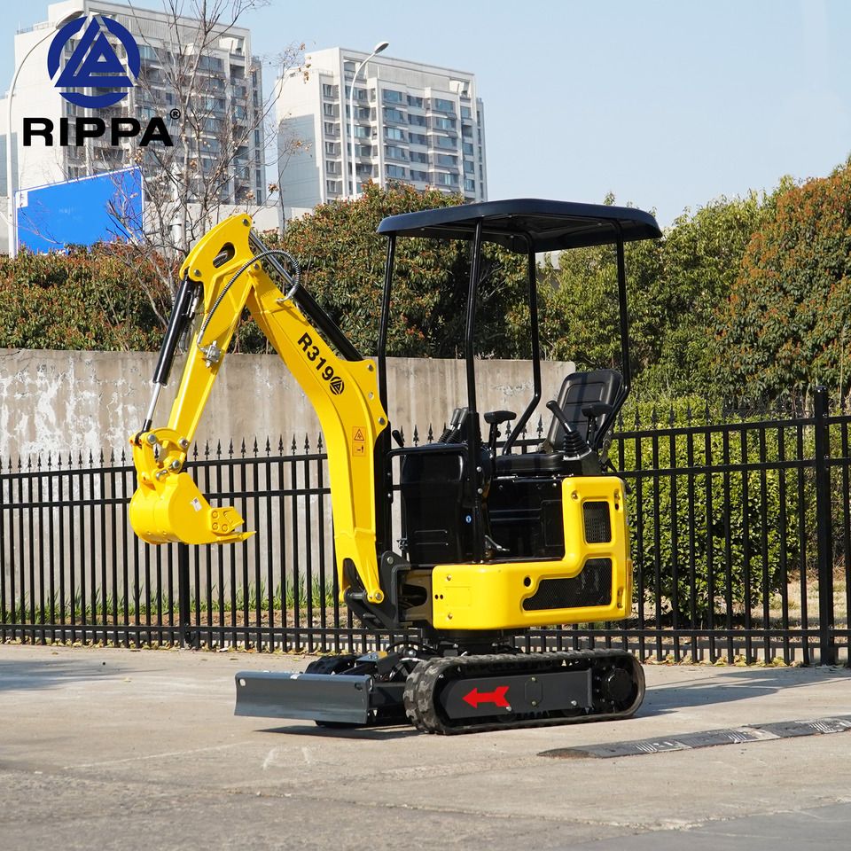 2026 Kubota R319 mini excavator, side view 2026 Kubota R319 mini excavator, side view