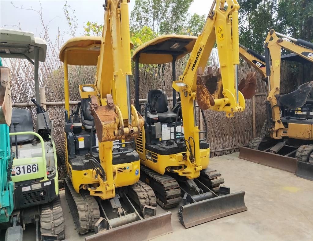 2023 Komatsu PC18MR-3 mini excavator, front three-quarter view 2023 Komatsu PC18MR-3 mini excavator, front three-quarter view