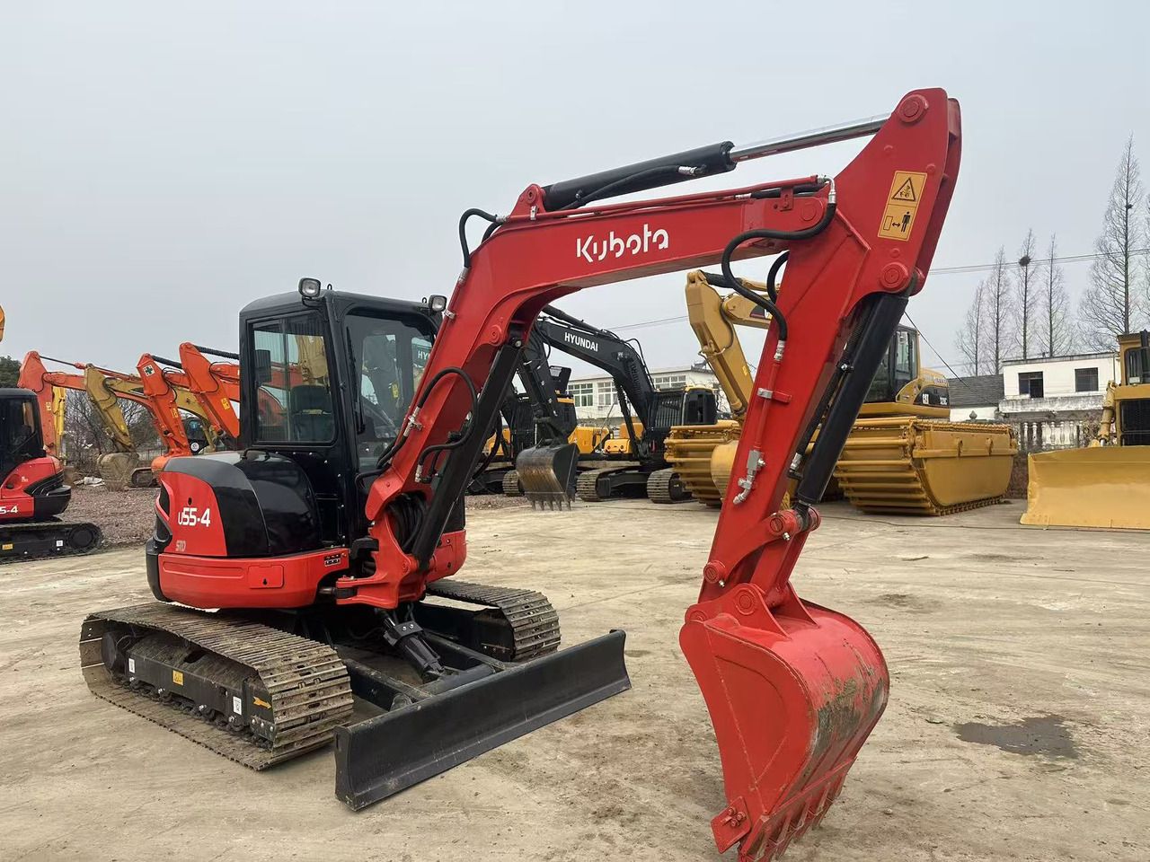 Kubota U55-4 crawler excavator, side view Kubota U55-4 crawler excavator, side view