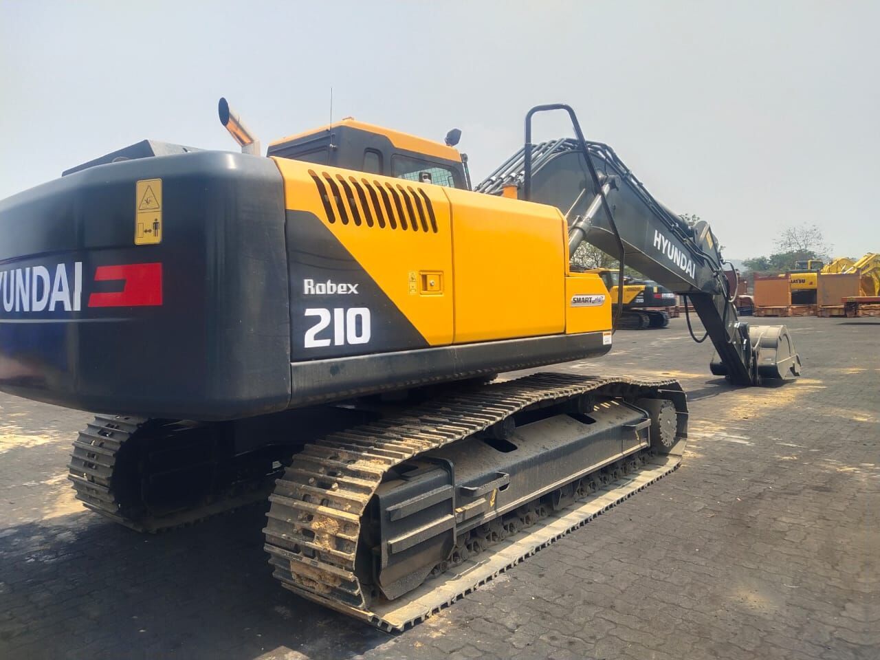 2025 Hyundai Robex 210 crawler excavator, rear three-quarter view 2025 Hyundai Robex 210 crawler excavator, rear three-quarter view