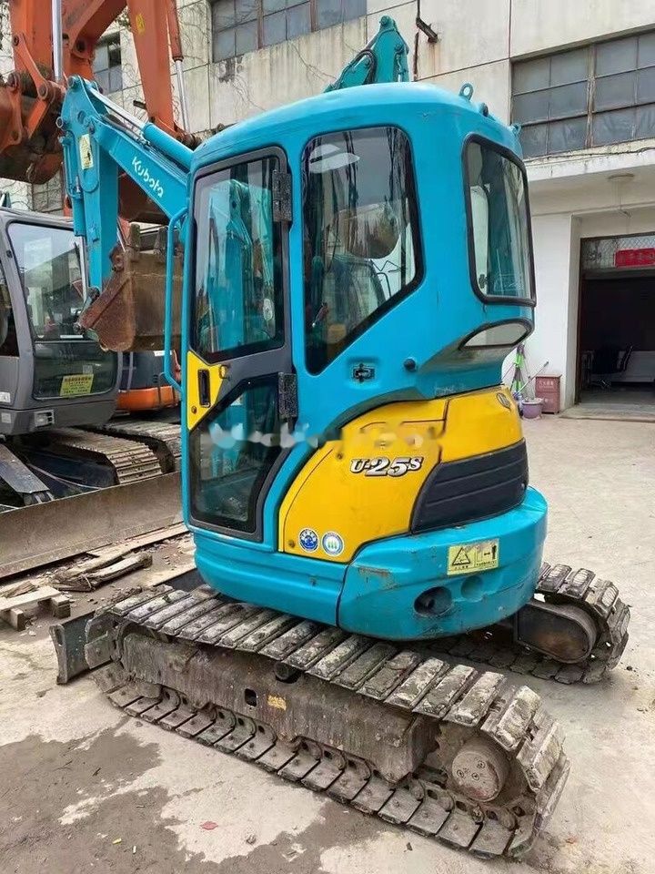 Kubota U25S mini excavator, rear three-quarter view Kubota U25S mini excavator, rear three-quarter view