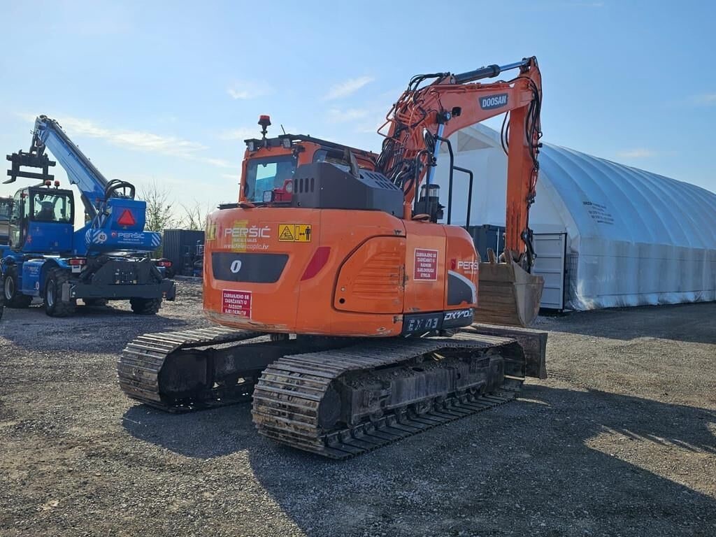 2021 Doosan DX140LCR-5 crawler excavator, rear three-quarter view