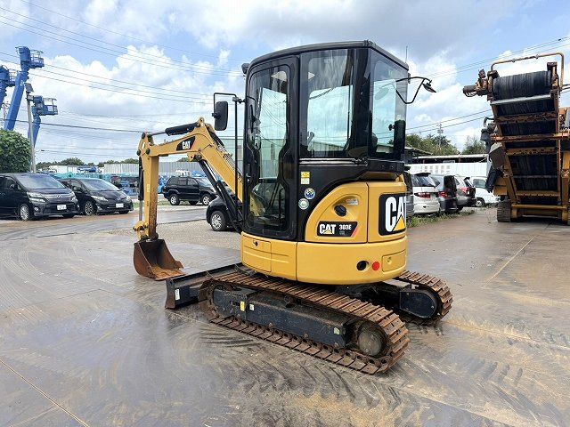 2014 Caterpillar 303E mini excavator, rear three-quarter view 2014 Caterpillar 303E mini excavator, rear three-quarter view