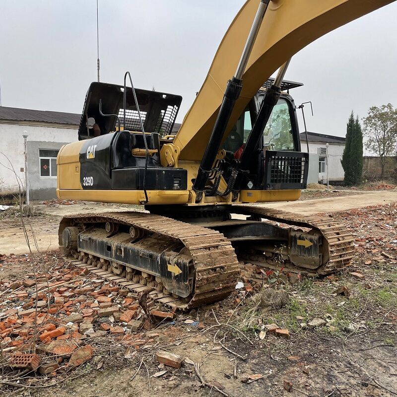 Caterpillar 329D crawler excavator, side view Caterpillar 329D crawler excavator, side view