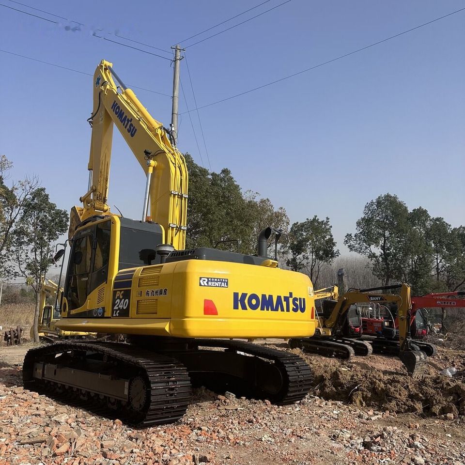Komatsu PC240LC-8 crawler excavator, rear three-quarter view Komatsu PC240LC-8 crawler excavator, rear three-quarter view