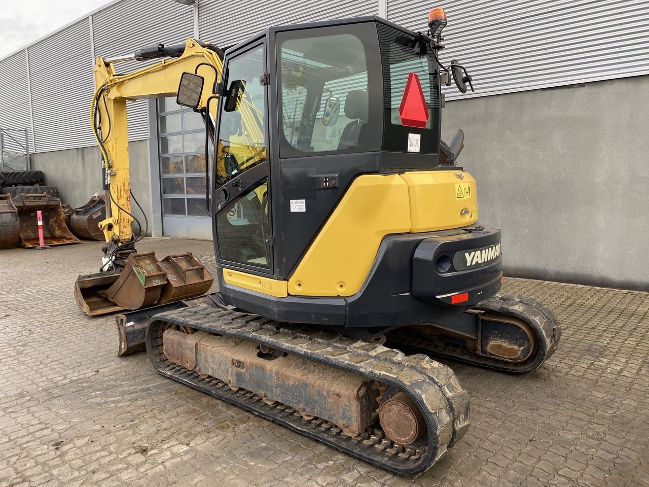 2017 Yanmar VIO80-1A mini excavator, rear three-quarter view 2017 Yanmar VIO80-1A mini excavator, rear three-quarter view
