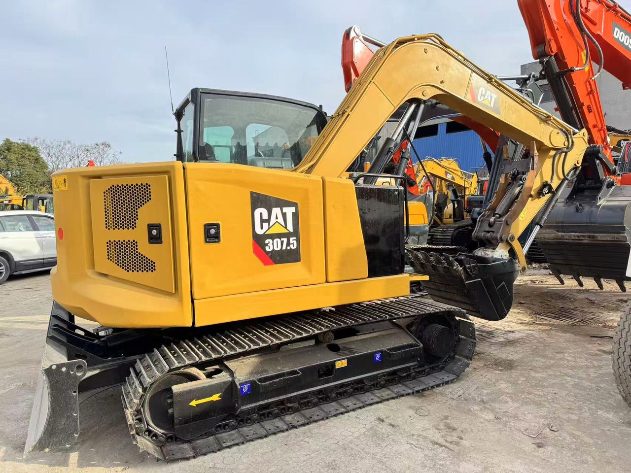 2024 Caterpillar 307.5 mini excavator, rear three-quarter view 2024 Caterpillar 307.5 mini excavator, rear three-quarter view