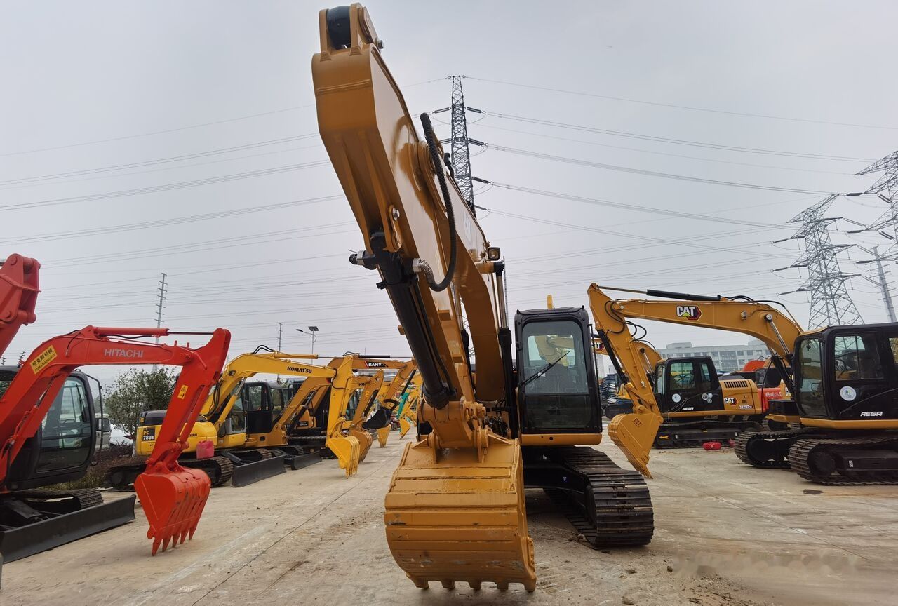 2020 Caterpillar 315D2 crawler excavator, front view 2020 Caterpillar 315D2 crawler excavator, front view