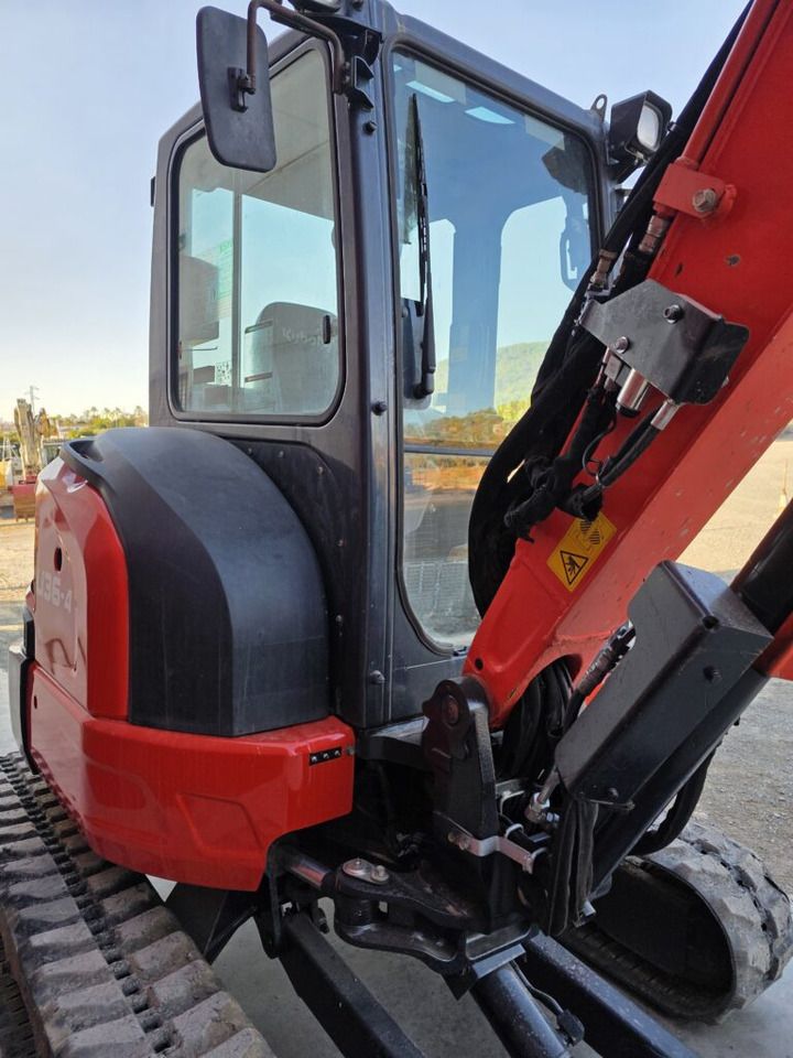 2021 Kubota U36-4 mini excavator, side view of cab and boom 2021 Kubota U36-4 mini excavator, side view of cab and boom
