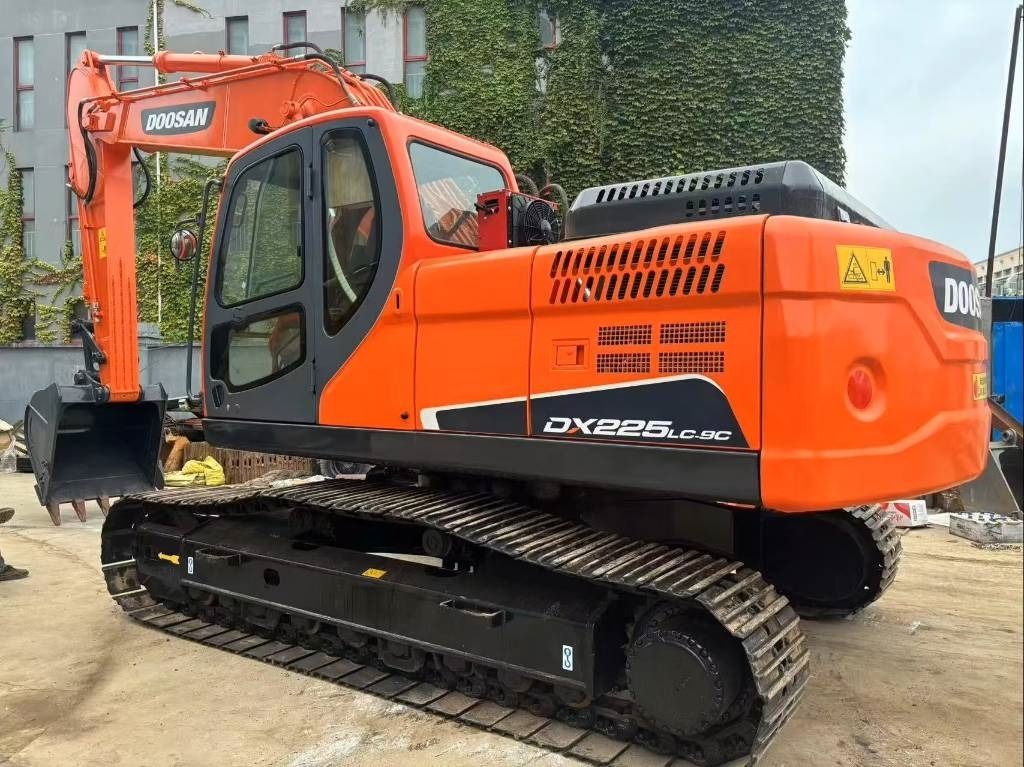 2022 Doosan DX225LC-9C crawler excavator, rear three-quarter view