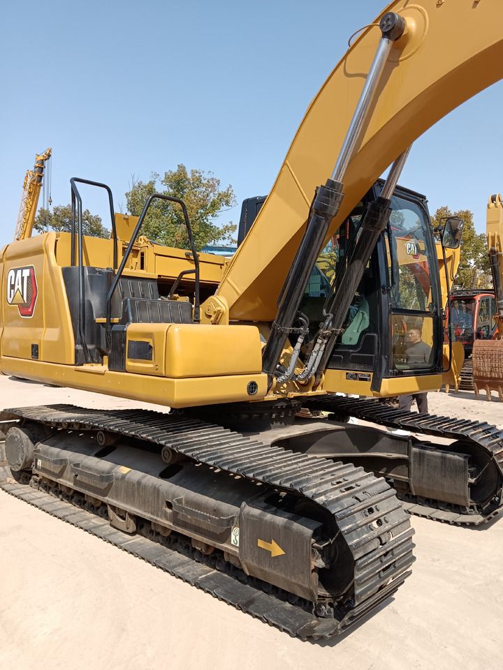 2023 Caterpillar 320GC crawler excavator, side view