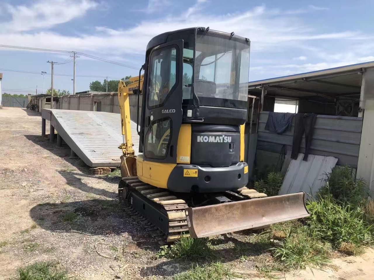 2024 Komatsu PC30MR mini excavator, rear three-quarter view