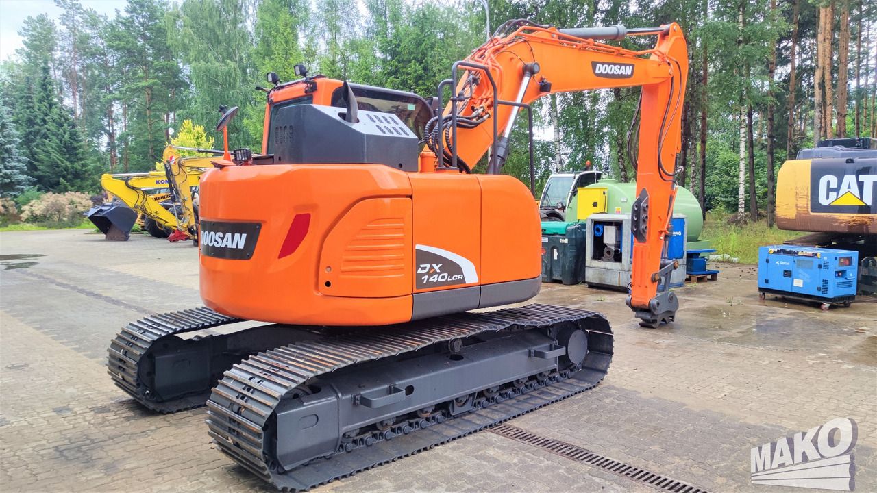 2018 Doosan DX140LCR-5 crawler excavator, rear three-quarter view 2018 Doosan DX140LCR-5 crawler excavator, rear three-quarter view