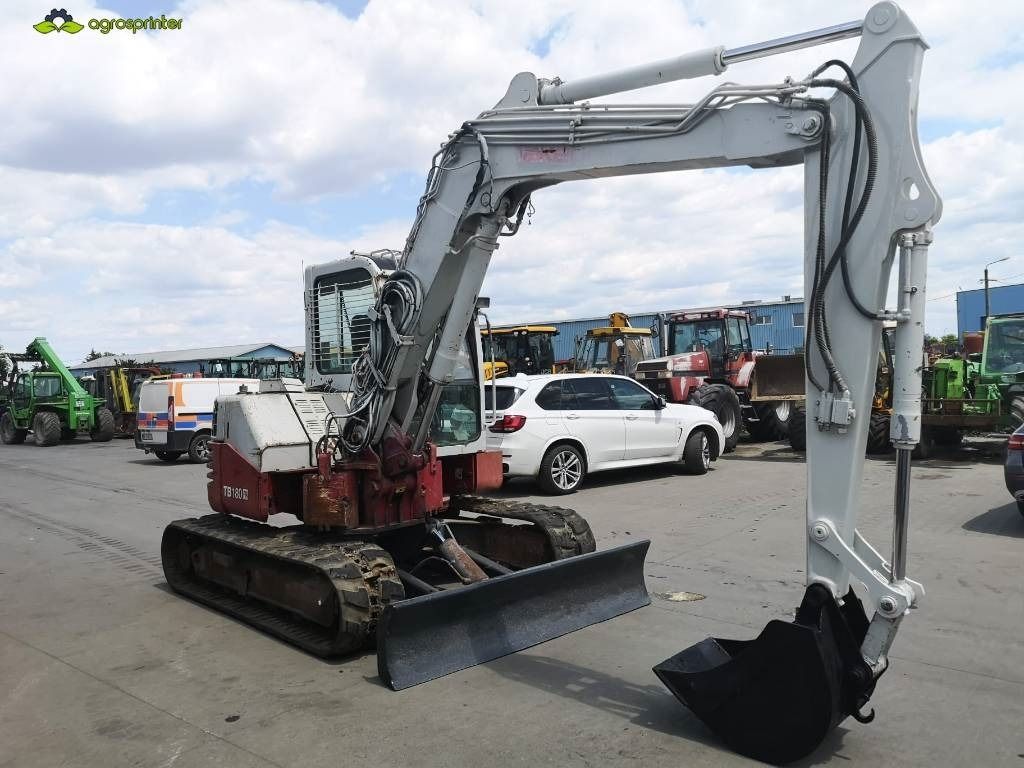 2006 Takeuchi TB180FR mini excavator, front three-quarter view 2006 Takeuchi TB180FR mini excavator, front three-quarter view