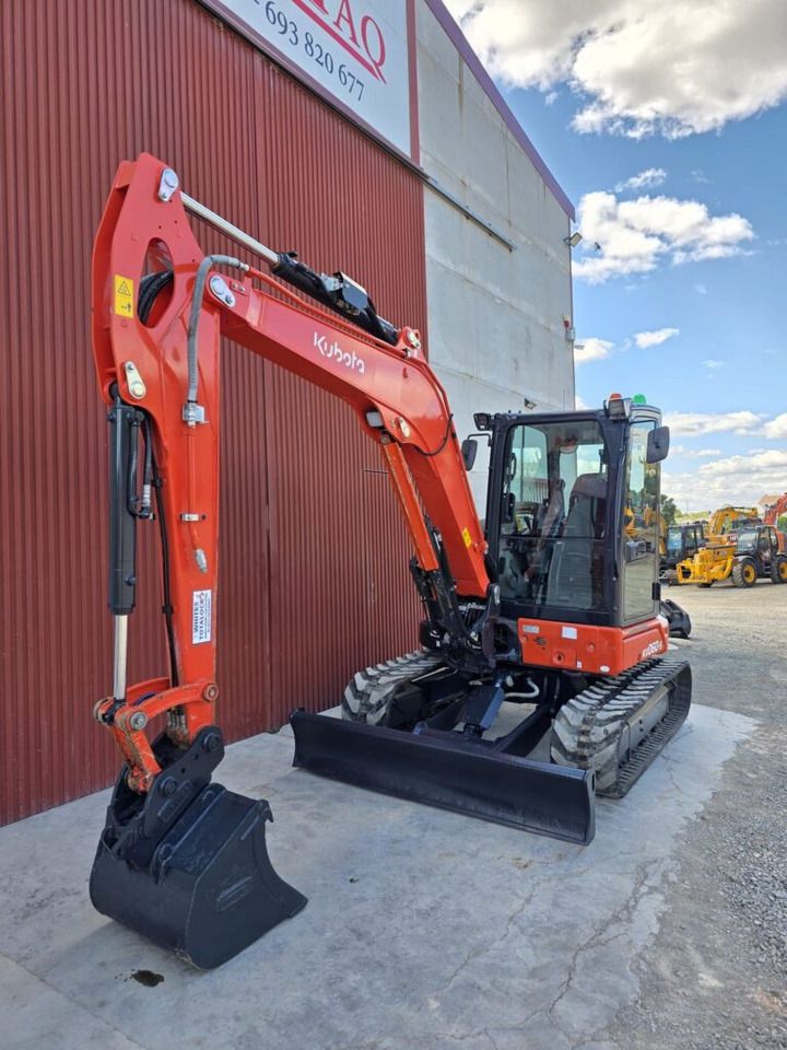 2022 Kubota KX060-5 mini excavator, front three-quarter view