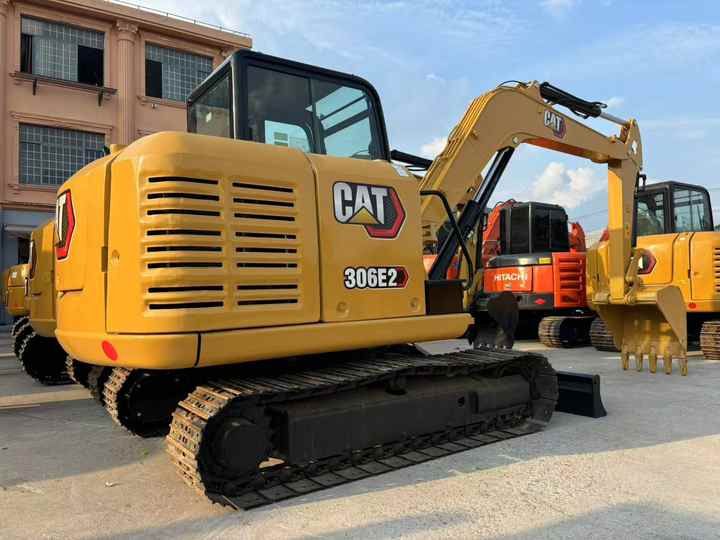 2024 Caterpillar 306E2 mini excavator, rear three-quarter view 2024 Caterpillar 306E2 mini excavator, rear three-quarter view