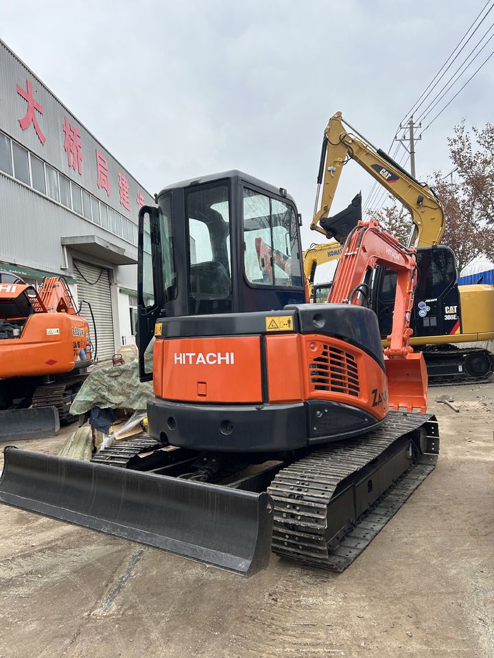 2024 Hitachi ZX50U mini excavator, rear three-quarter view