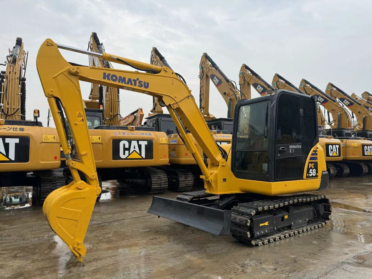 2022 Komatsu PC58 crawler excavator, front three-quarter view