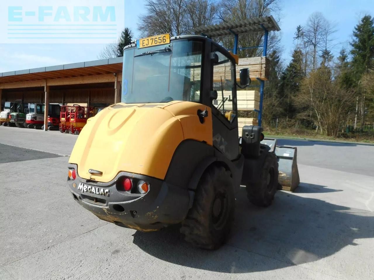 2015 Manitou AX850 wheel loader, rear three-quarter view 2015 Manitou AX850 wheel loader, rear three-quarter view