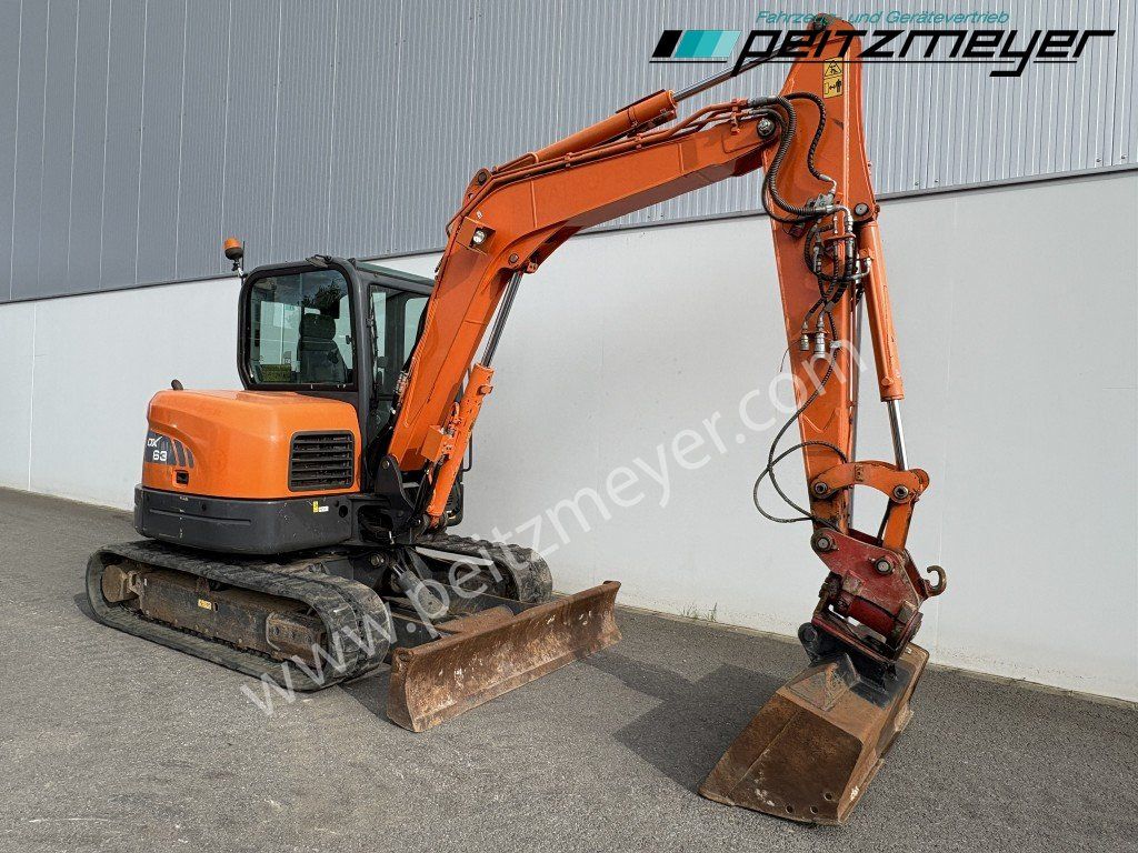 2018 Doosan DX63-3 mini excavator, side view 2018 Doosan DX63-3 mini excavator, side view