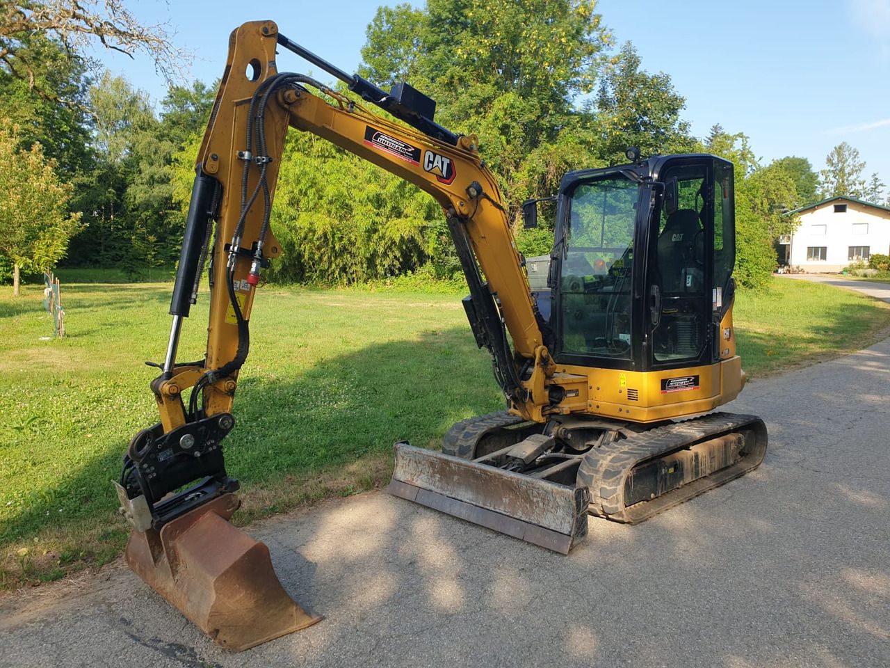 2022 Caterpillar 304-07 mini excavator, side profile view