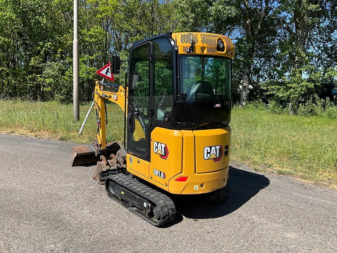 2023 Caterpillar 301.6 mini excavator, rear three-quarter view 2023 Caterpillar 301.6 mini excavator, rear three-quarter view