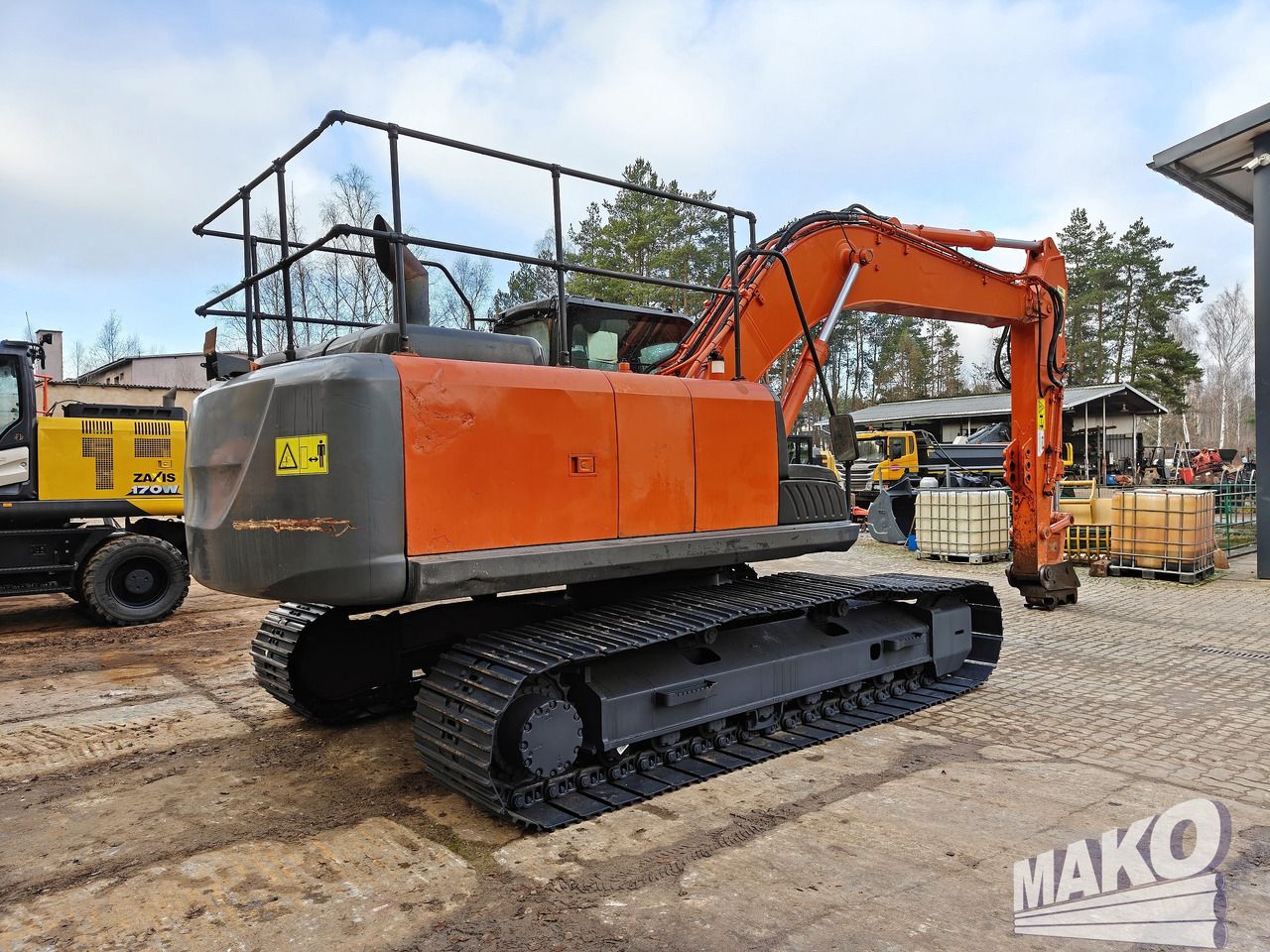 2015 Hitachi ZX210LC-5B crawler excavator rear three-quarter view