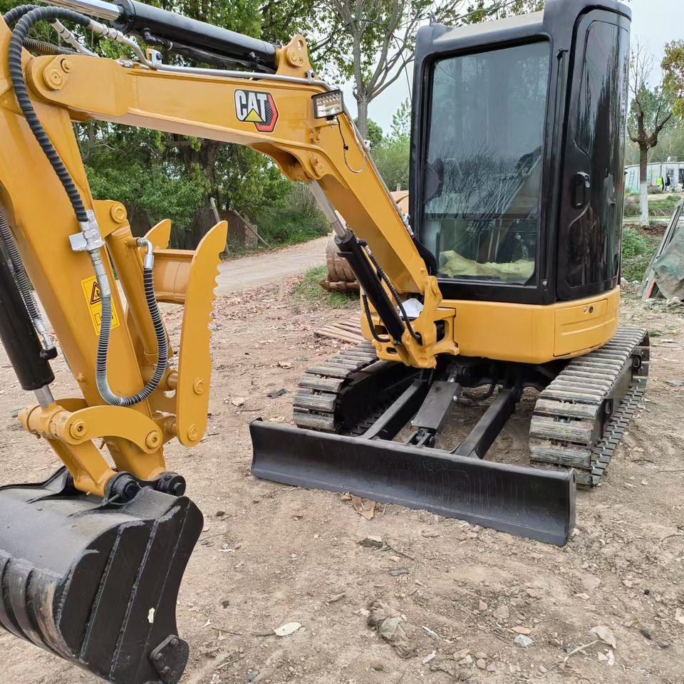 2023 Caterpillar 303.5E mini excavator, front three-quarter view 2023 Caterpillar 303.5E mini excavator, front three-quarter view
