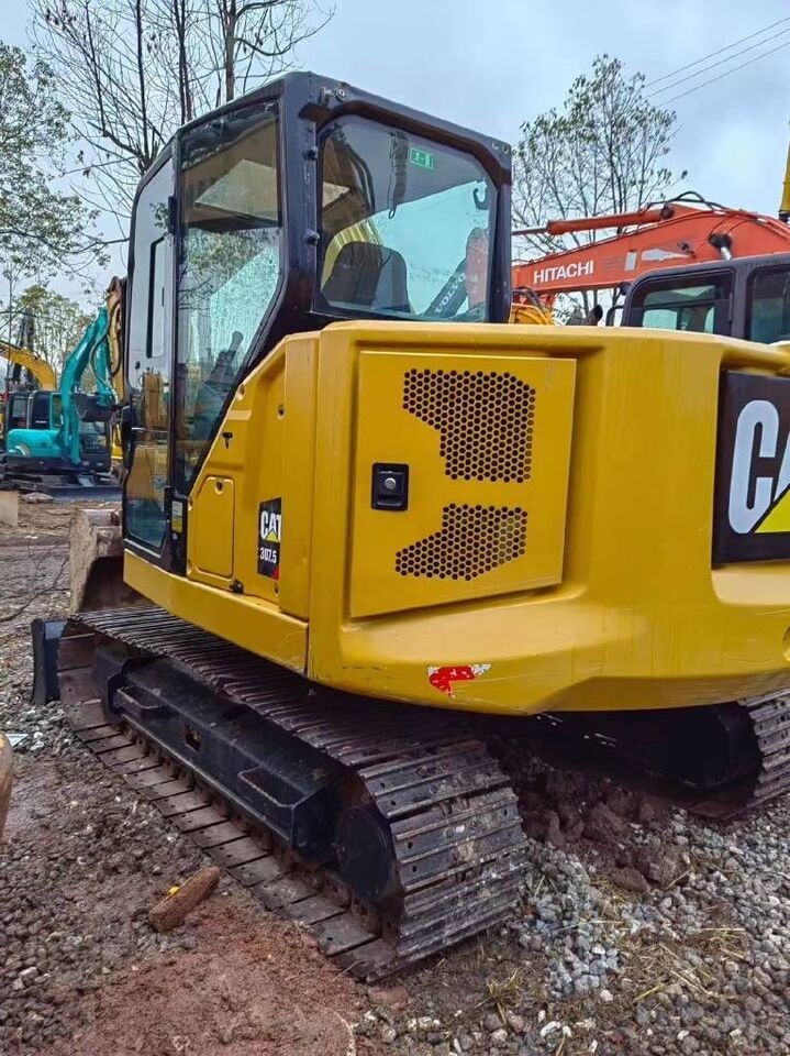 2025 Caterpillar 307.5 crawler excavator, rear three-quarter view 2025 Caterpillar 307.5 crawler excavator, rear three-quarter view