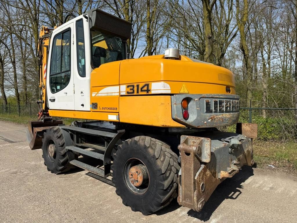 2008 Liebherr 314 Litronic wheel excavator rear three-quarter view 2008 Liebherr 314 Litronic wheel excavator rear three-quarter view