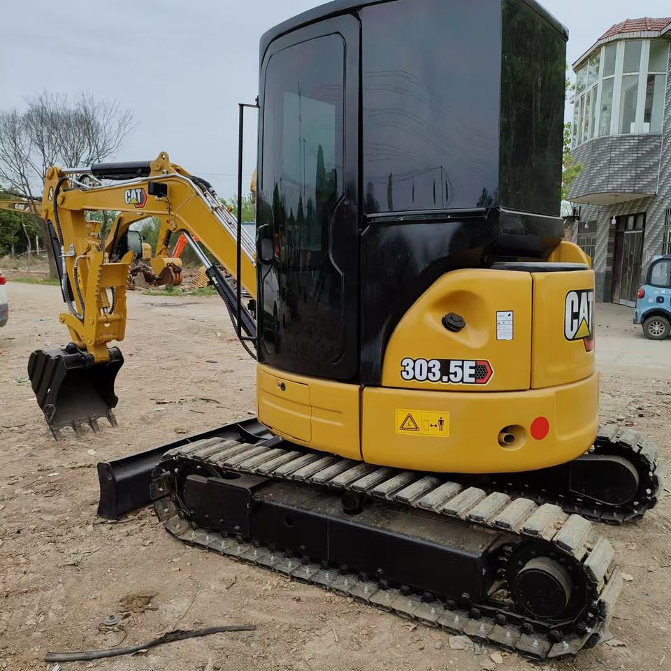 2023 Caterpillar 303.5E mini excavator, rear three-quarter view 2023 Caterpillar 303.5E mini excavator, rear three-quarter view