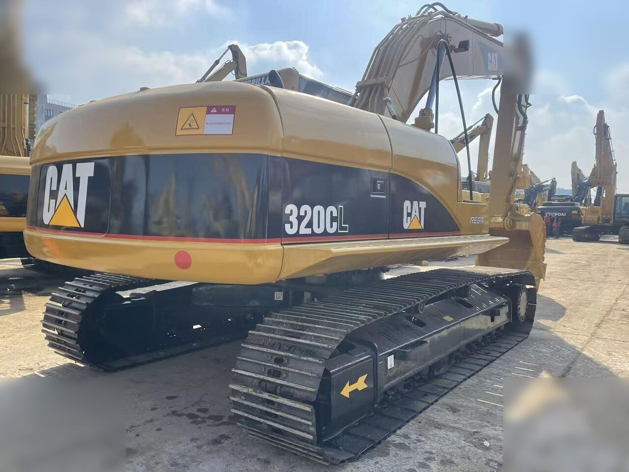 2024 Caterpillar 320CL paletli ekskavatör, arka çapraz görünüm 2024 Caterpillar 320CL paletli ekskavatör, arka çapraz görünüm