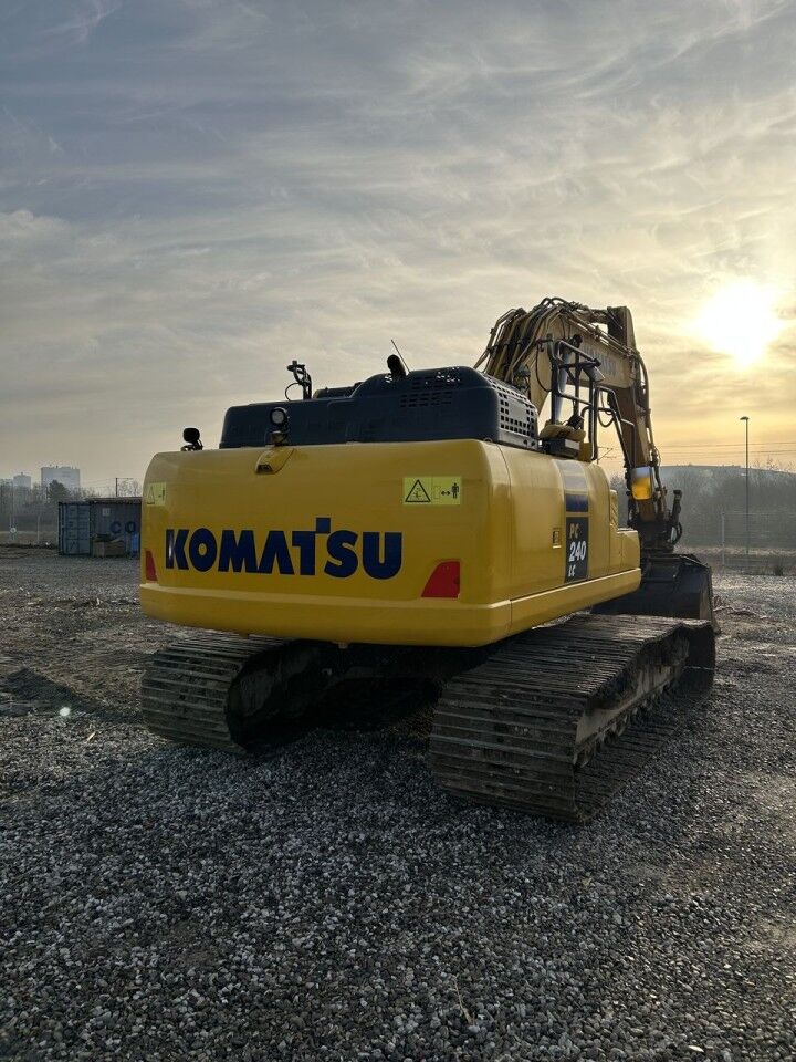 2021 Komatsu PC240LC-11 crawler excavator, rear three-quarter view 2021 Komatsu PC240LC-11 crawler excavator, rear three-quarter view