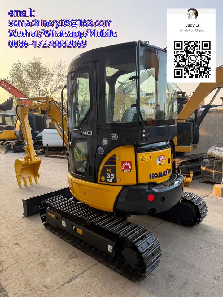 2021 Komatsu PC35 MR mini excavator, rear three-quarter view 2021 Komatsu PC35 MR mini excavator, rear three-quarter view