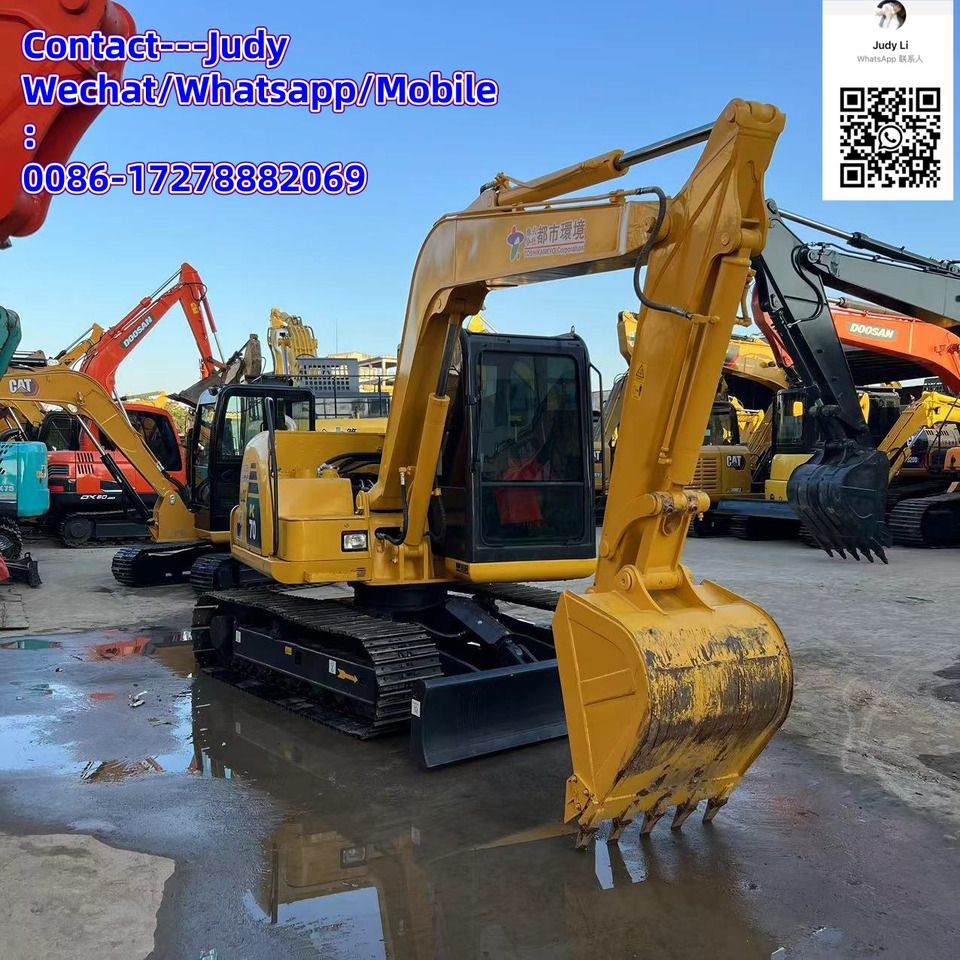 2021 Komatsu KX70 mini excavator, front three-quarter view 2021 Komatsu KX70 mini excavator, front three-quarter view