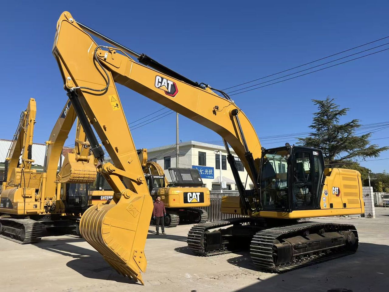 2024 Caterpillar 330GC crawler excavator, front three-quarter view