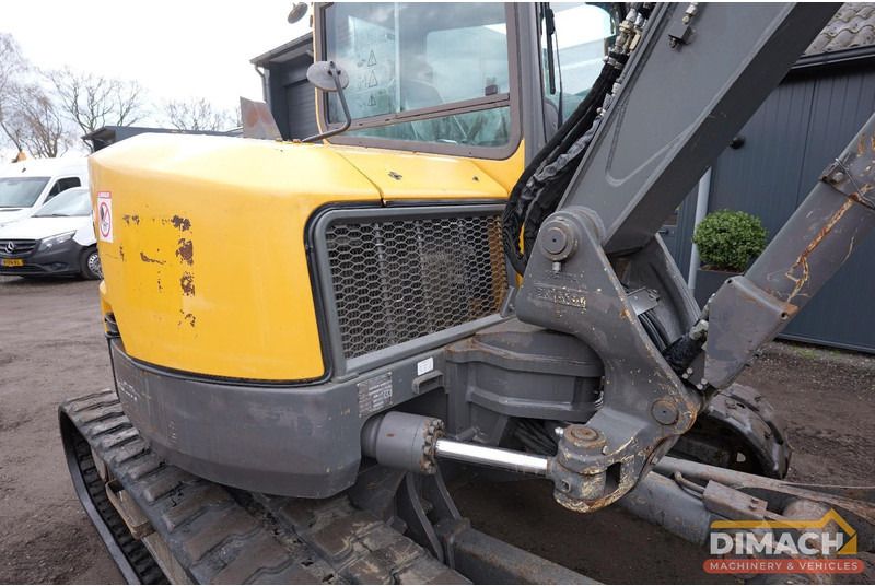 2015 Volvo ECR88 mini excavator, side view of the upper structure and boom 2015 Volvo ECR88 mini excavator, side view of the upper structure and boom
