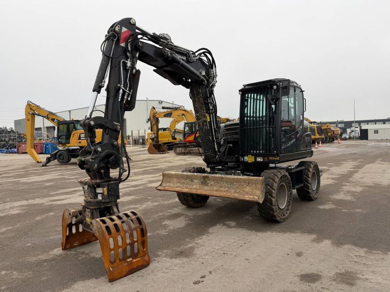 2023 Yanmar B95W wheeled excavator front three-quarter view