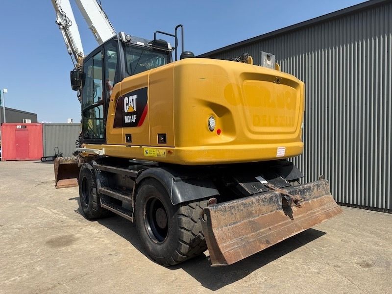 2017 Caterpillar M314F wheel excavator rear three-quarter view
