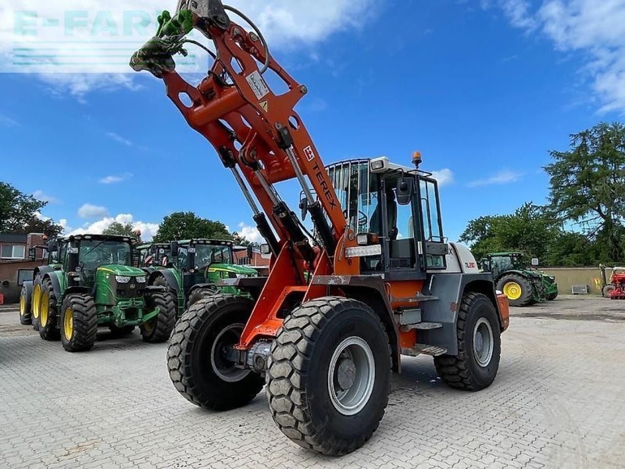 2012 Atlas TL210 wheel loader, front three-quarter view 2012 Atlas TL210 wheel loader, front three-quarter view