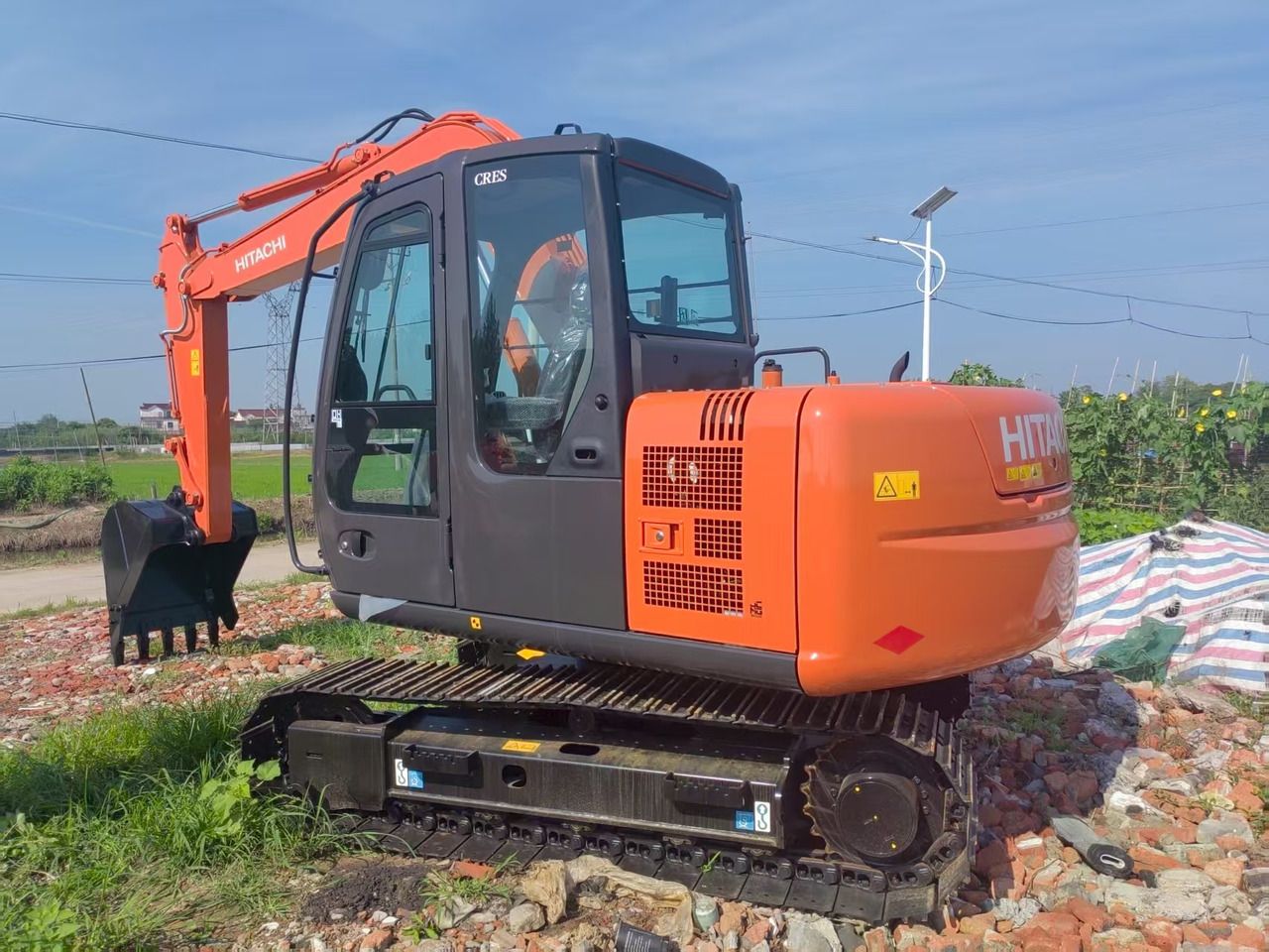 2025 Hitachi ZX60 mini excavator, rear three-quarter view 2025 Hitachi ZX60 mini excavator, rear three-quarter view