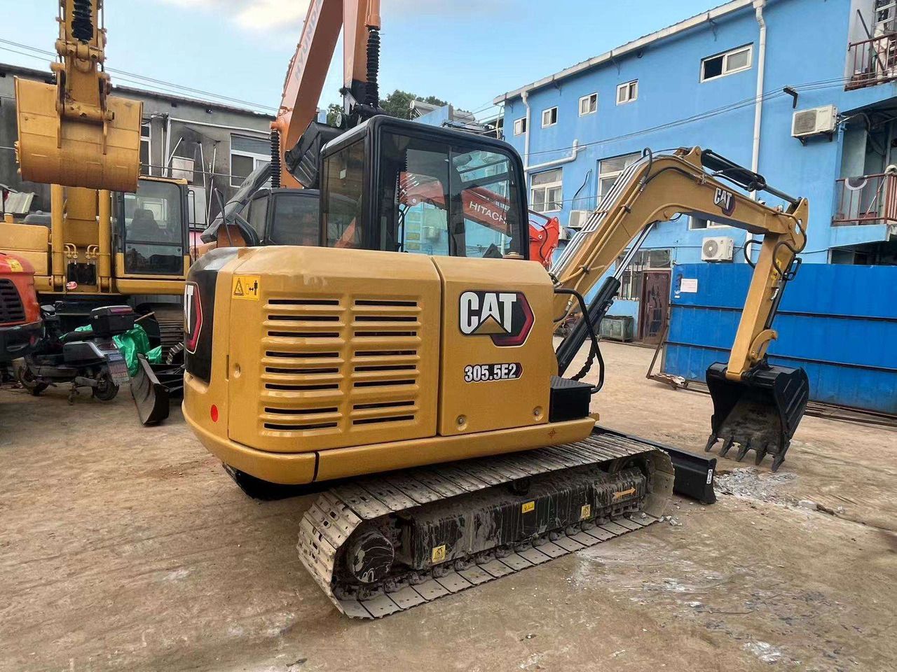 2018 Caterpillar 305.5E2 crawler excavator, rear three-quarter view 2018 Caterpillar 305.5E2 crawler excavator, rear three-quarter view