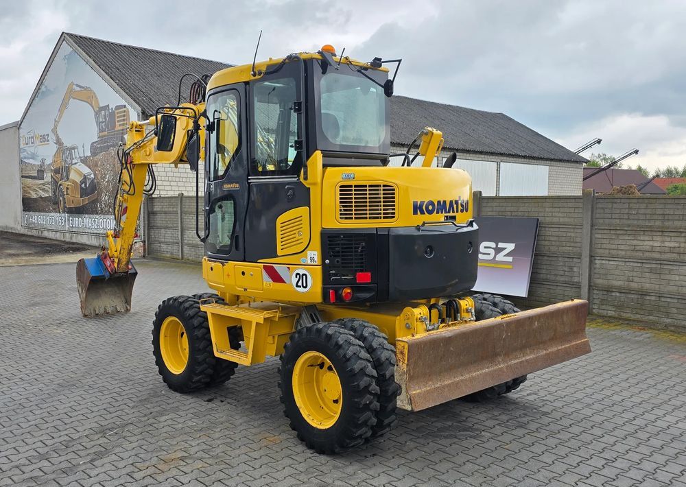 2017 Komatsu PW98MR-8 wheel excavator, rear three-quarter view 2017 Komatsu PW98MR-8 wheel excavator, rear three-quarter view